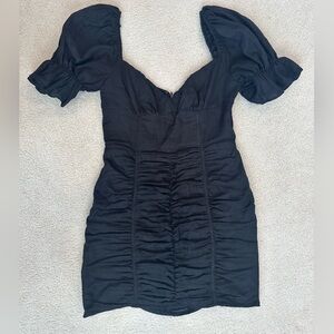 Cute Black dress Size M, with puffer sleeves